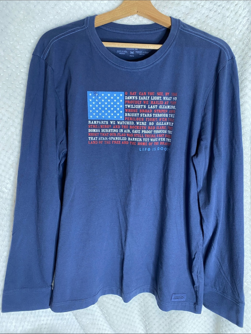 Life Is Good Blue Long Sleeve Tee with American Flag Text Graphic